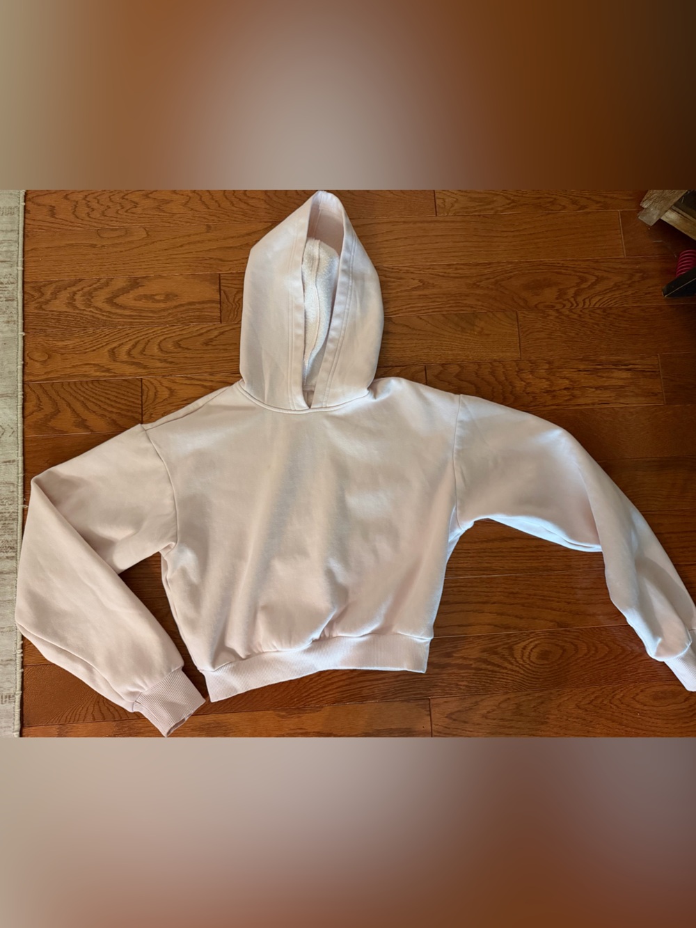 SKIMS Cropped Fleece-Lined Hoodie in Light Pink